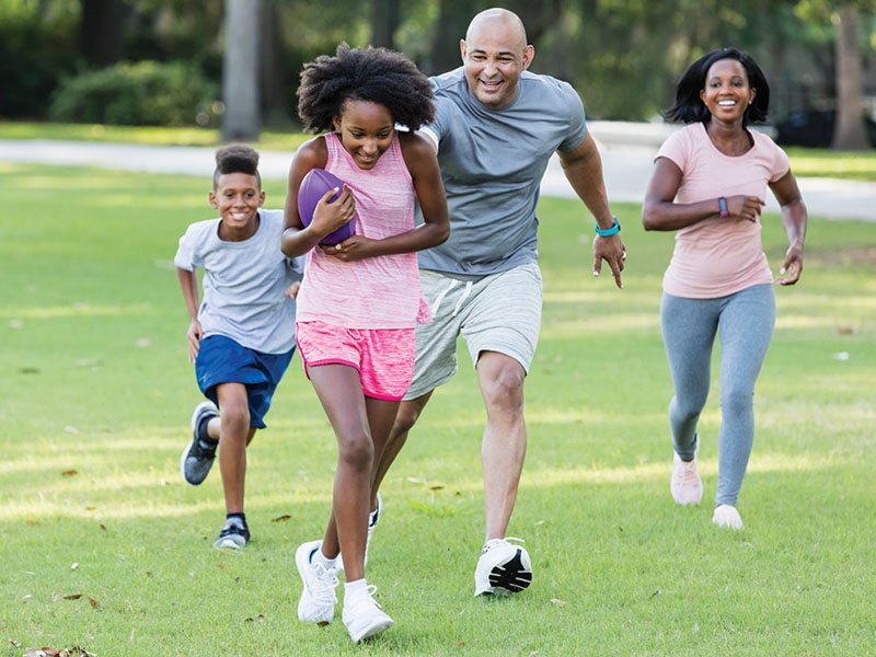 Family playing football