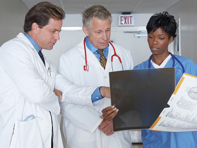 Medical Team looking at X-ray