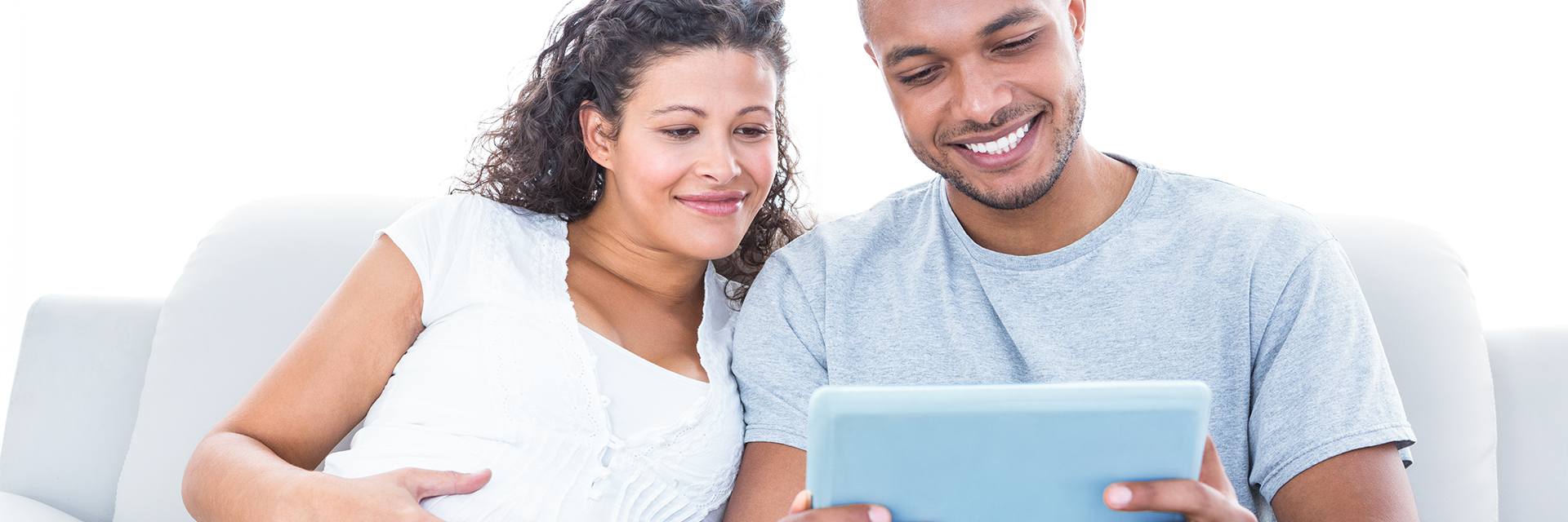 Man and woman on tablet