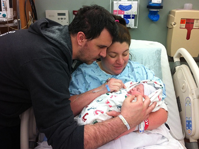 The Thompson Family Holds Their Second Daughter