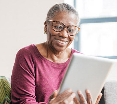 Woman Holding Mobile Device