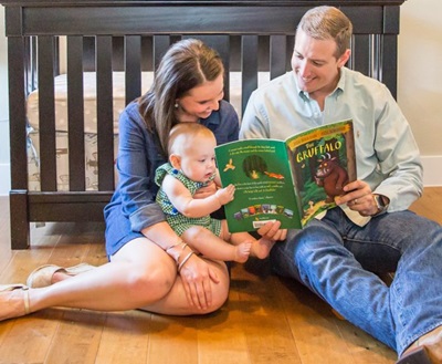 Griffith family reading a book