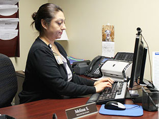 Melissa Salazar on computer