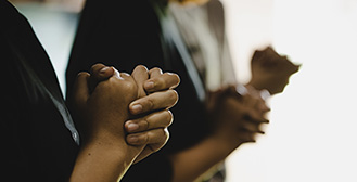 Two people praying