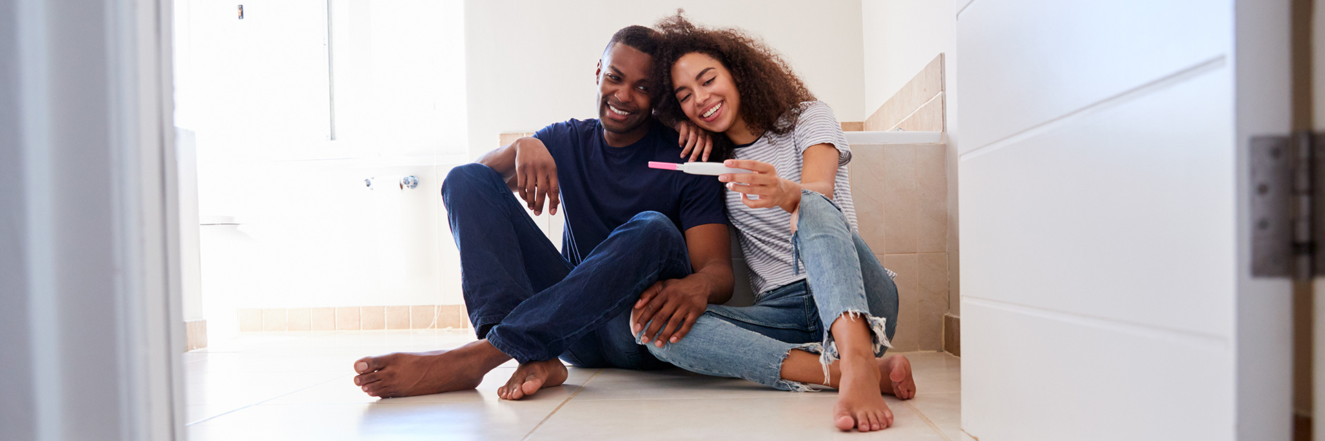 Couple Looking at Pregnancy Test