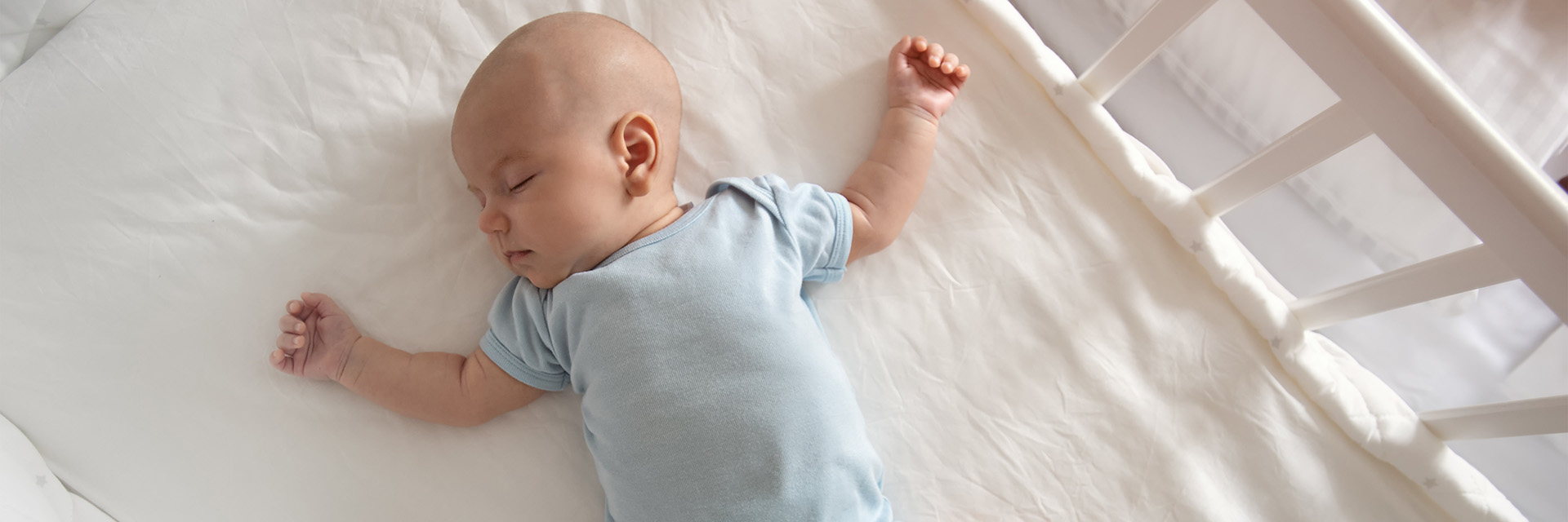 Baby sleeping in crib