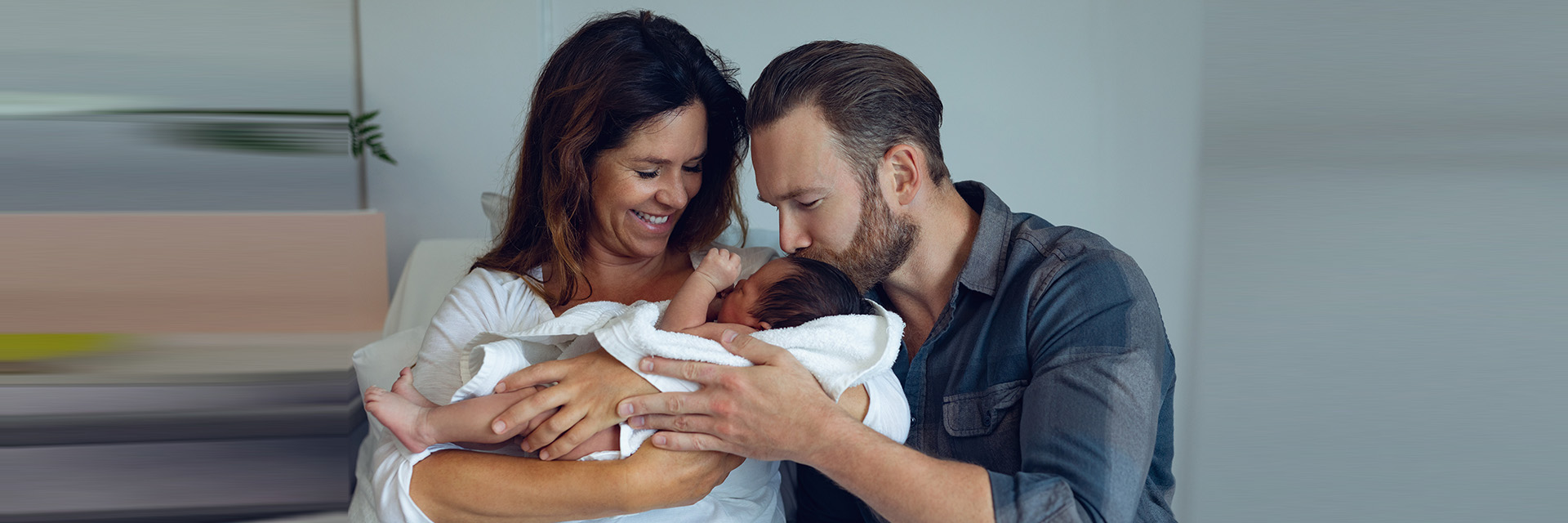 Couple holding baby