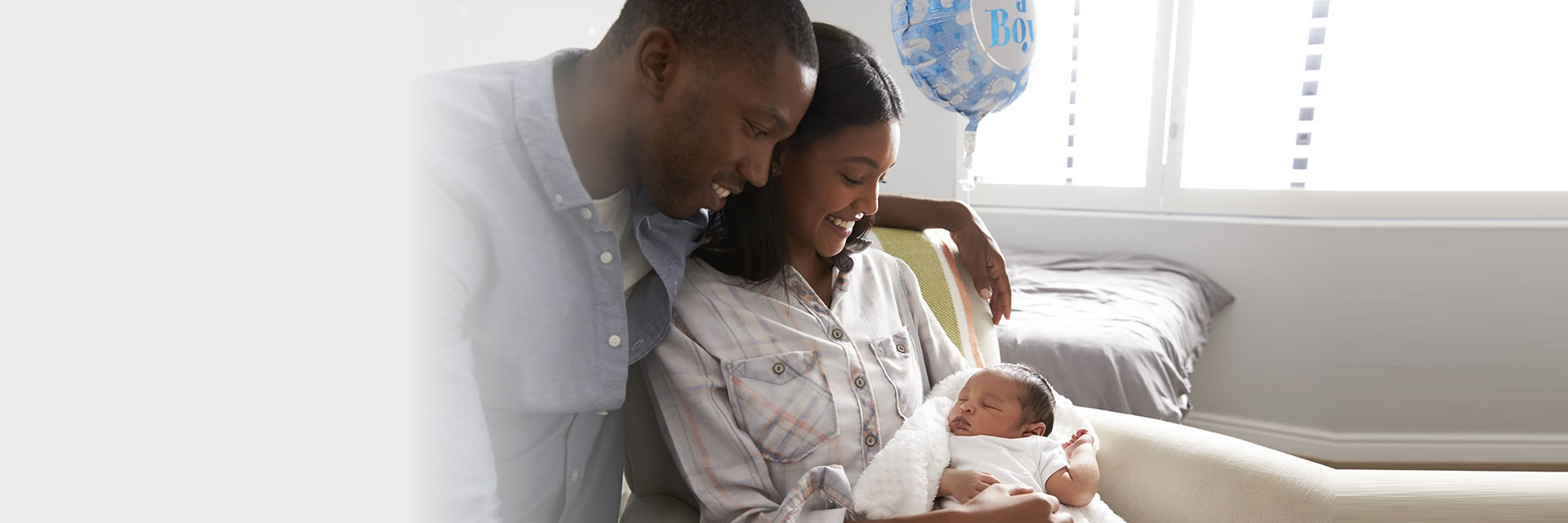 Couple holding baby