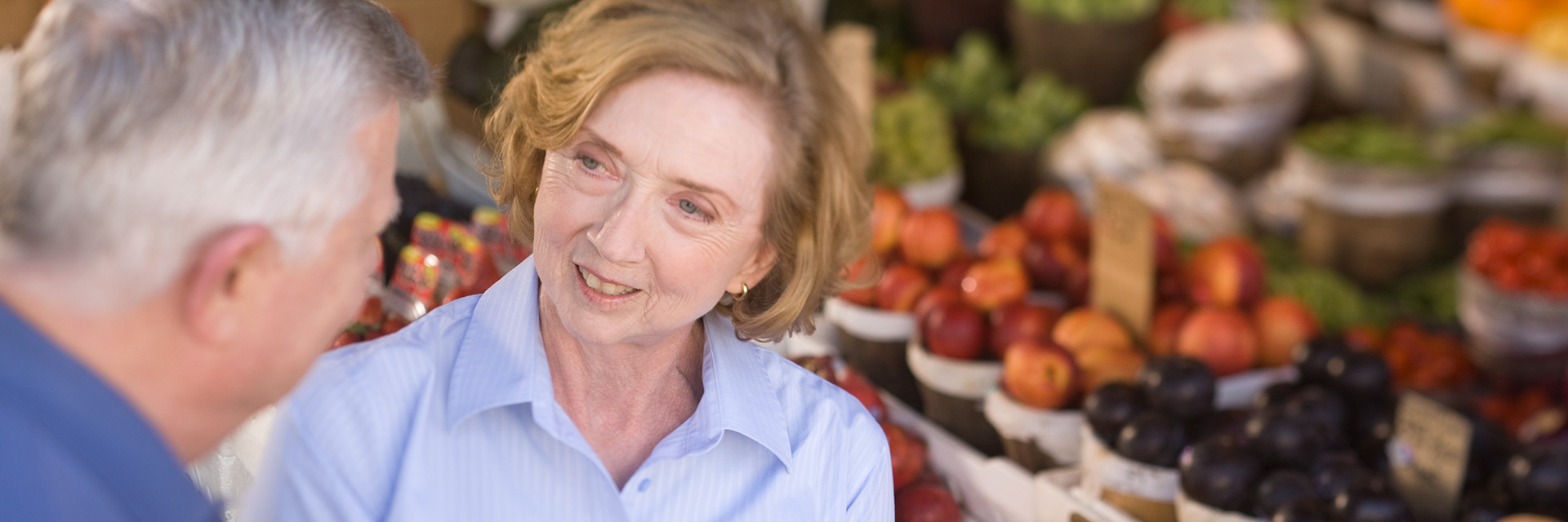 Couple Looking at Fruits