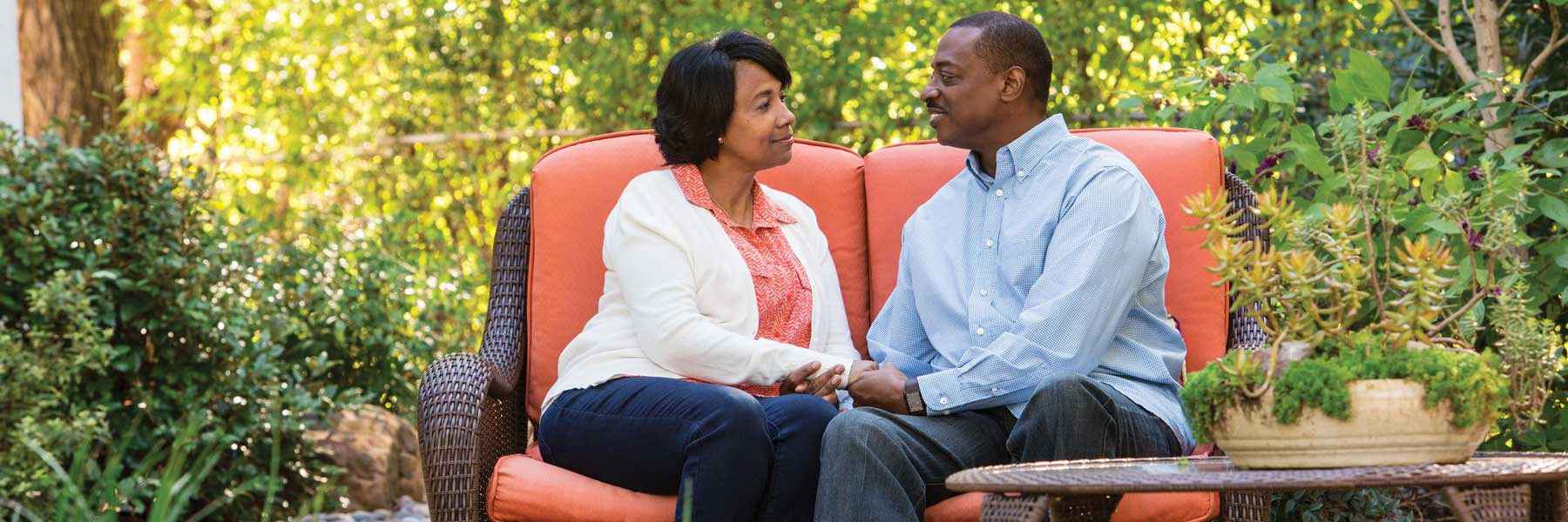 Couple Relaxing in Garden