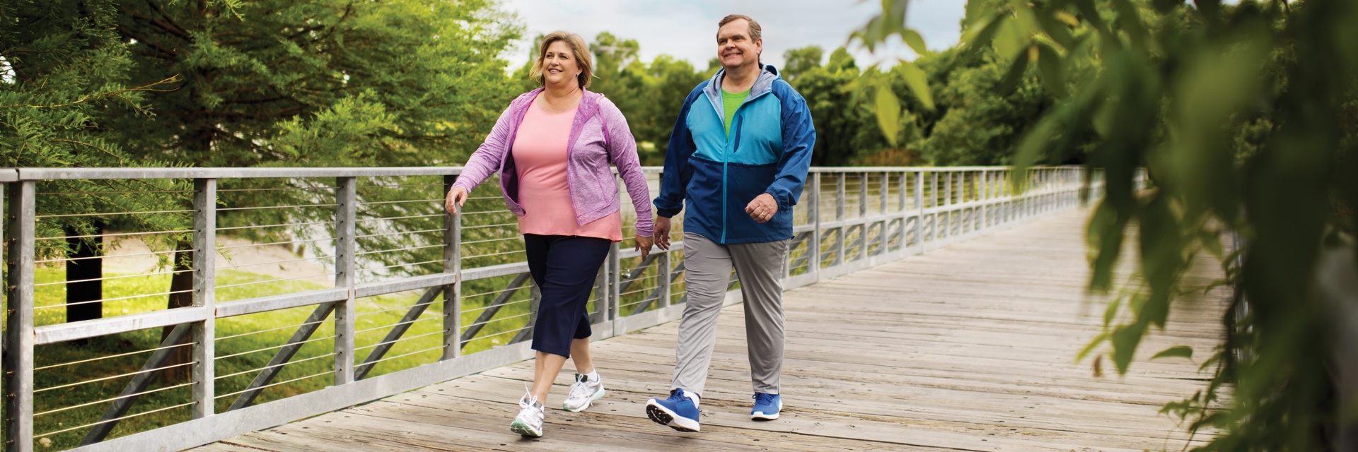 Couple walking outdoors at the park