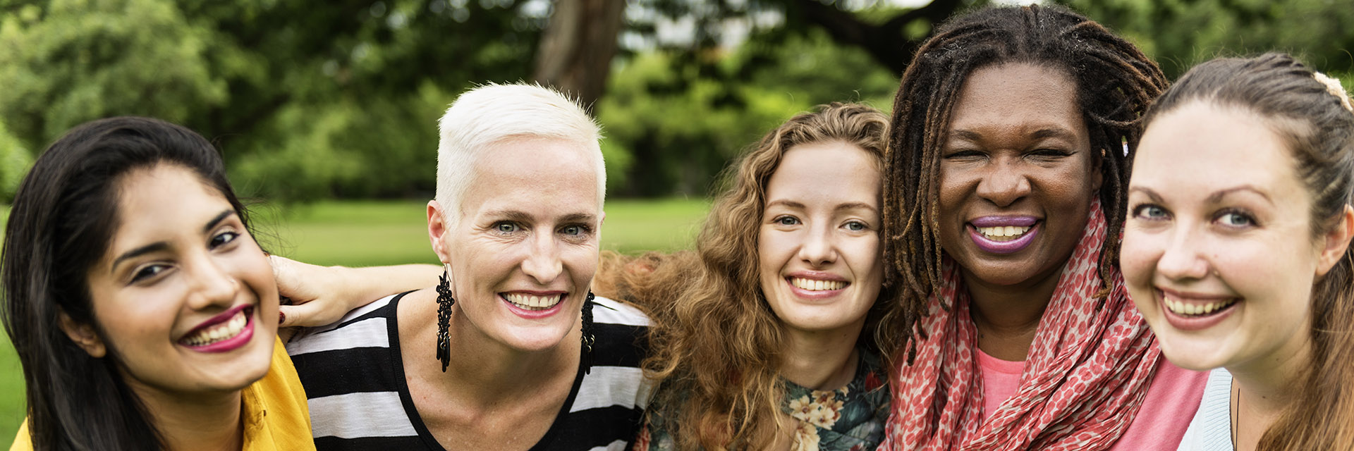 Four women standing outside