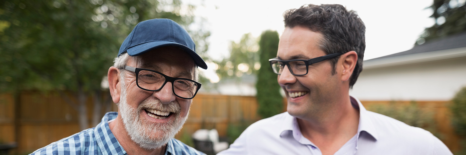 Father and son laughing and smiling
