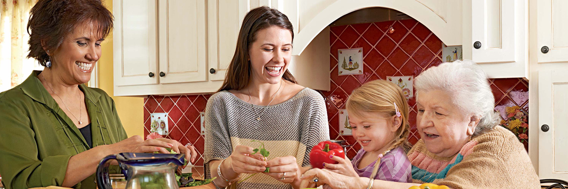 Generations cooking together in kitchen