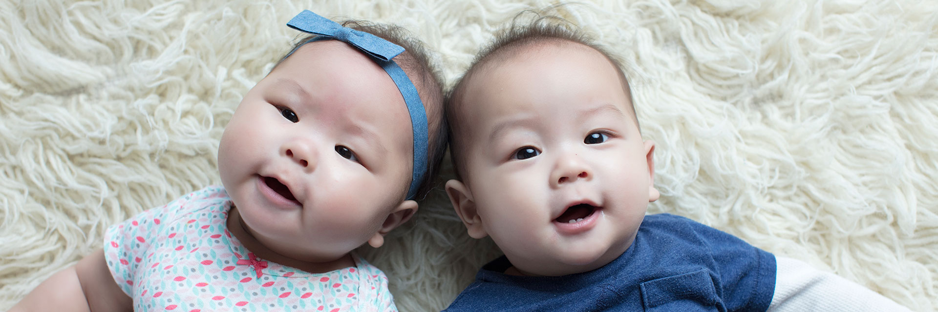 Infants laying on back