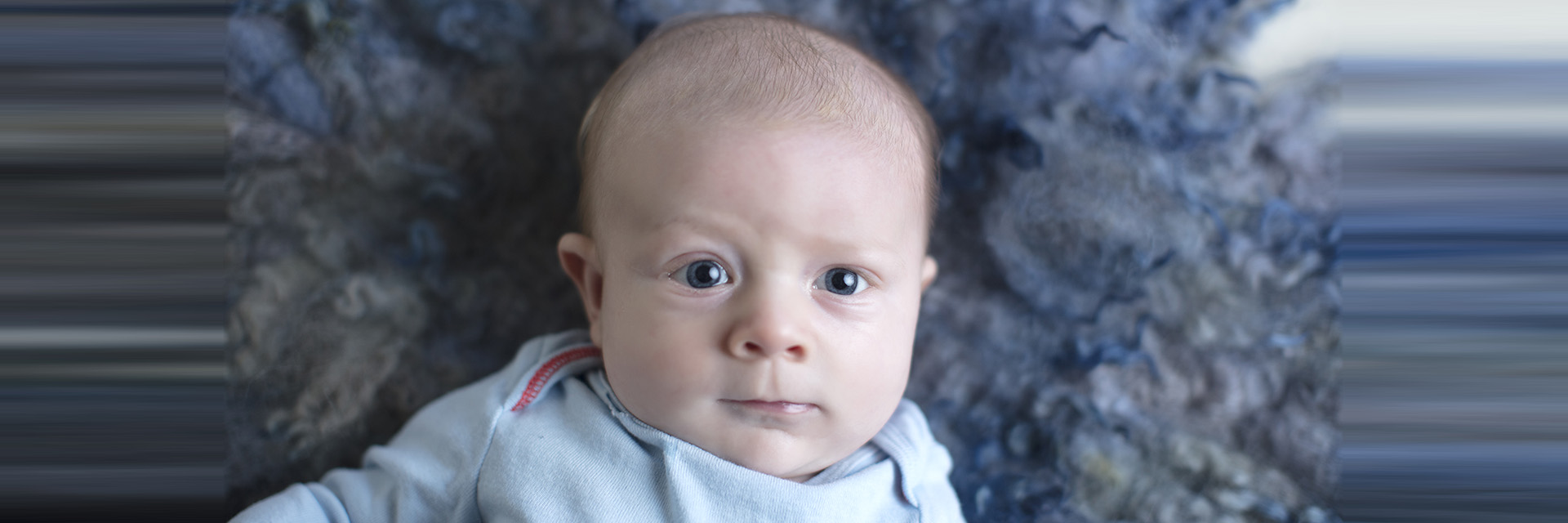 Infant baby on back
