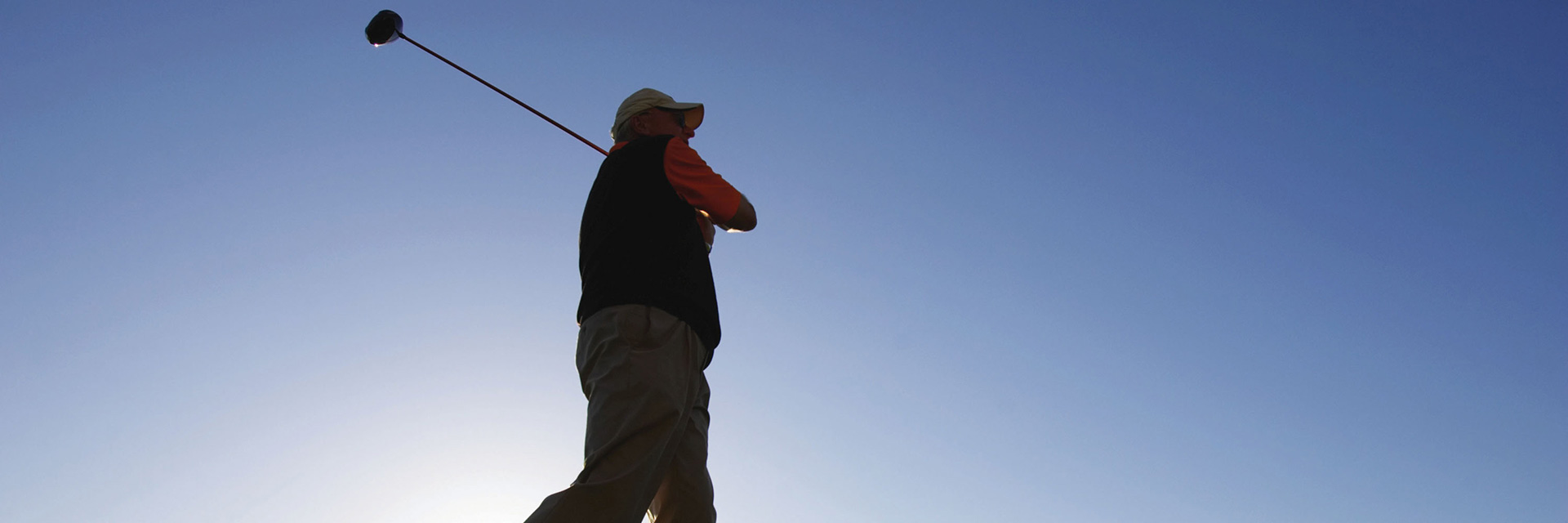 Man swinging golf club