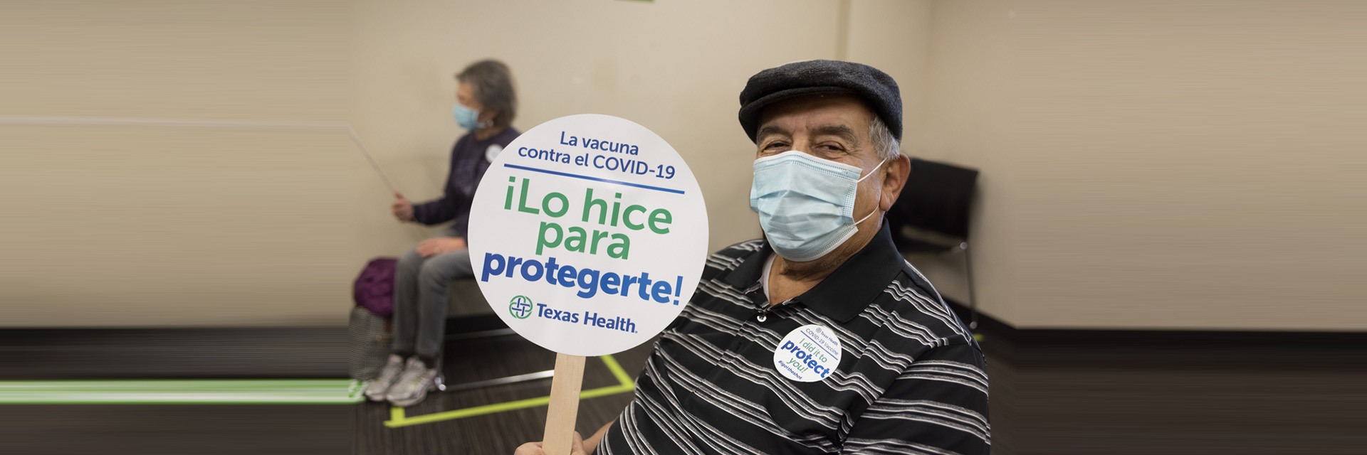 Man with vaccine sign