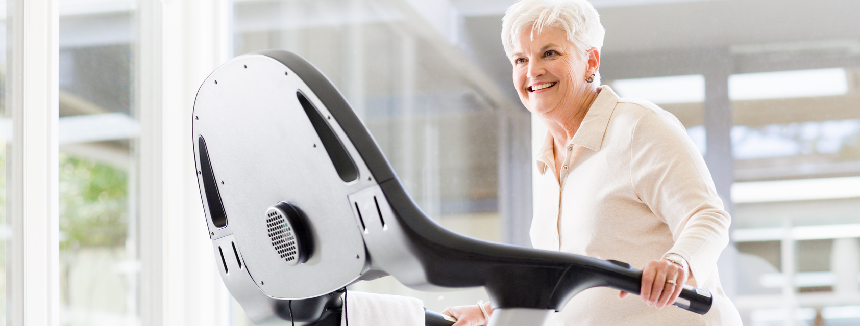 Mature woman on a treadmill