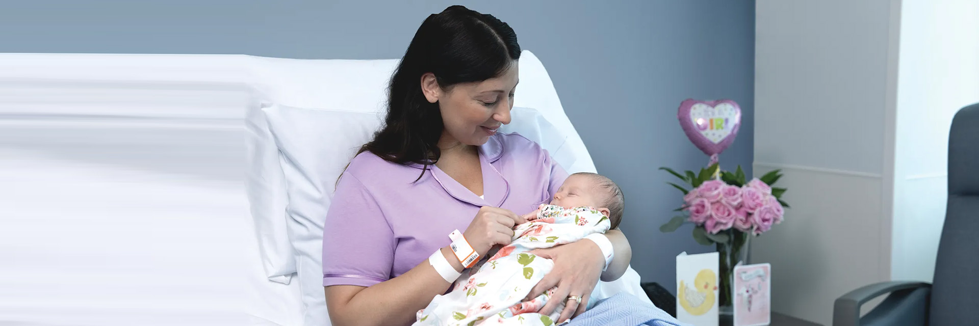 Mom with baby in hospital room