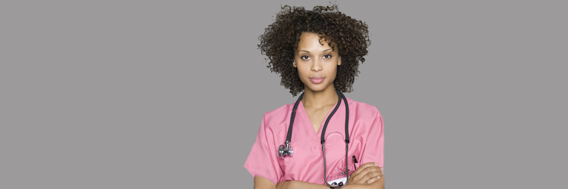 Nurse in pink scrubs