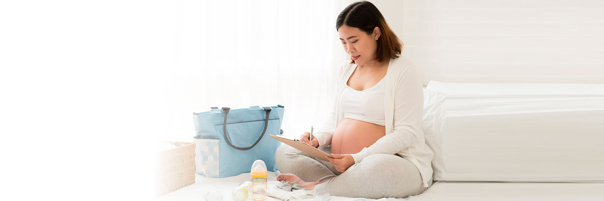 Pregnant Woman writing