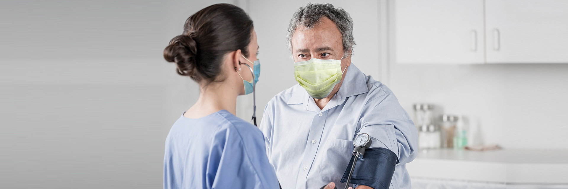 Provider taking blood pressure