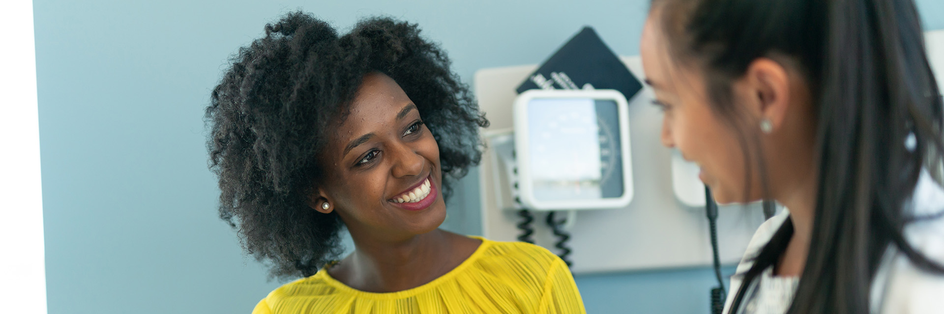 Woman Smiling at Provider