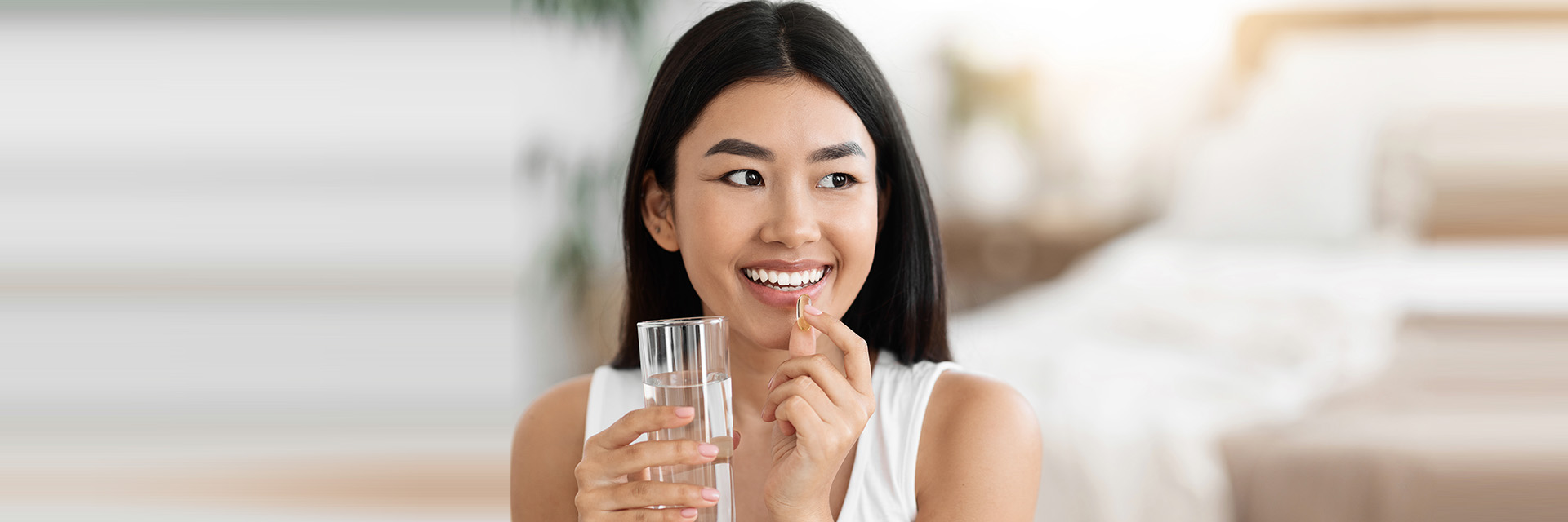 Woman taking medicine
