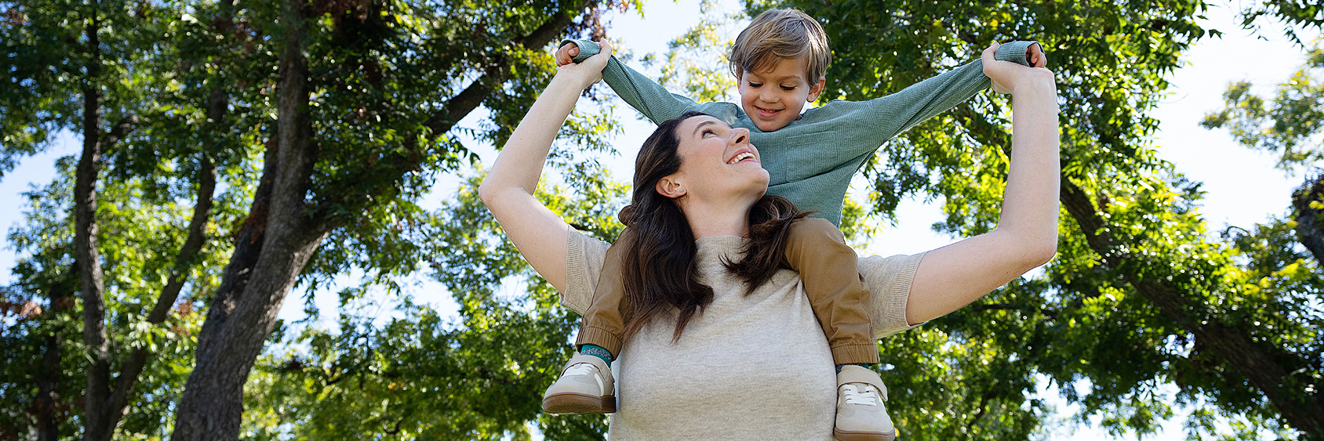 Mom with son on shoulders