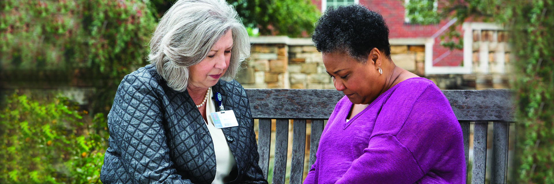Women Holding Hands and Praying