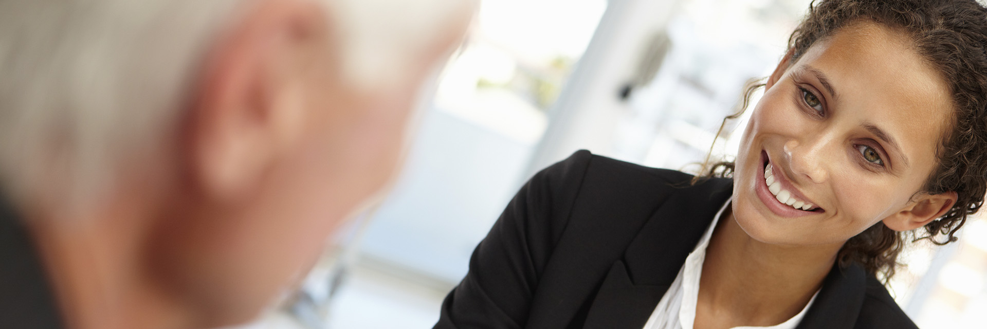 Man and Woman Talking During Interview