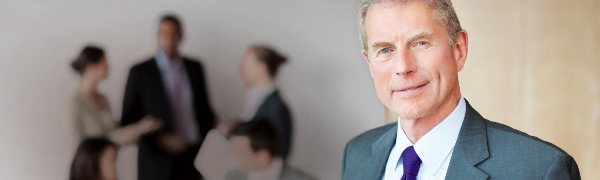 Business man standing in a suit