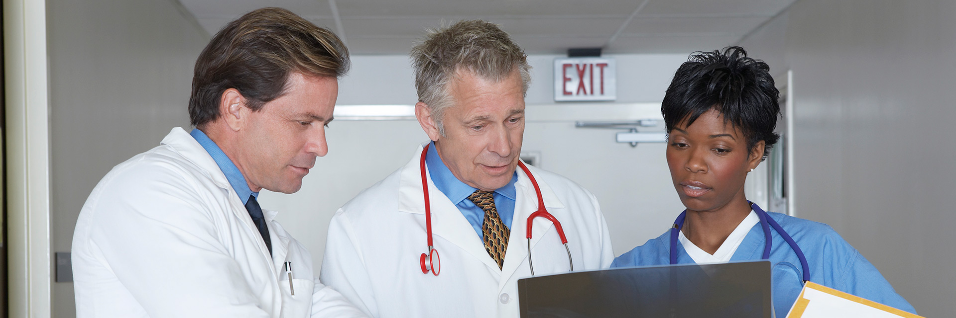 Medical team looking at x-ray