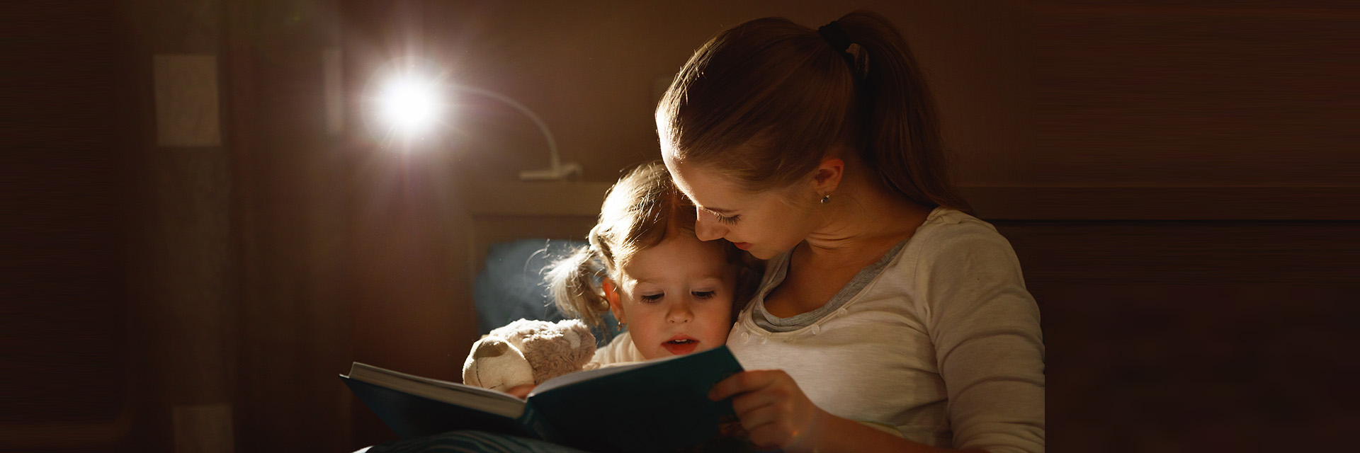 Parent reading with a young child