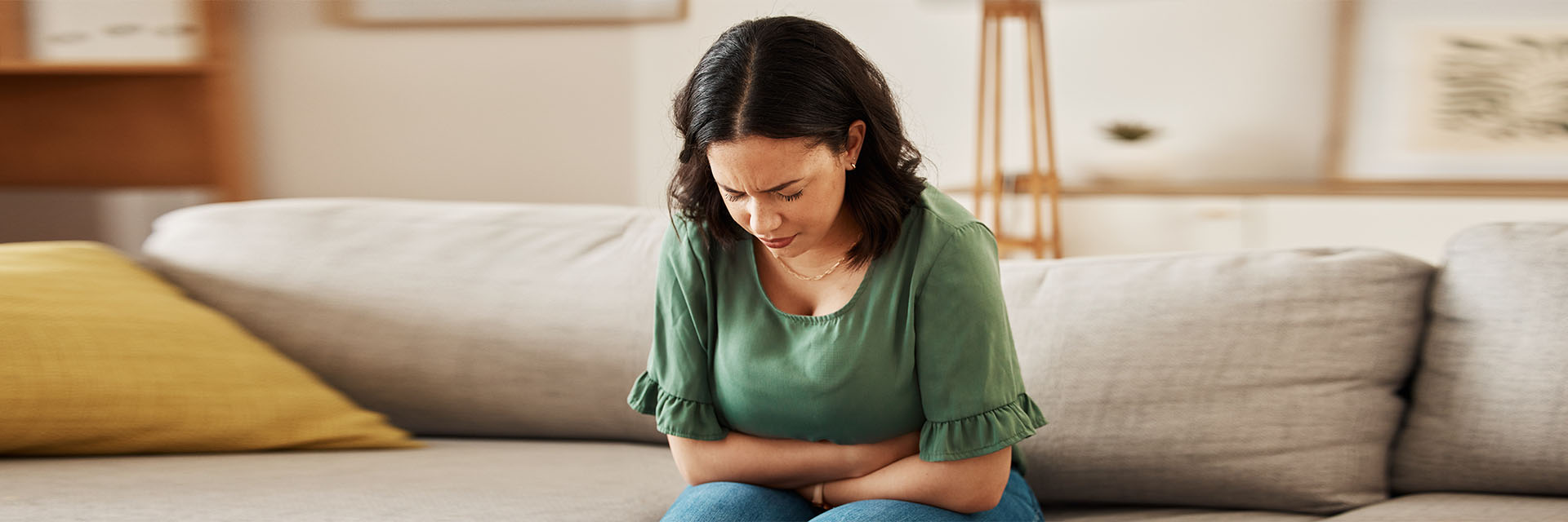 Stressed woman on couch
