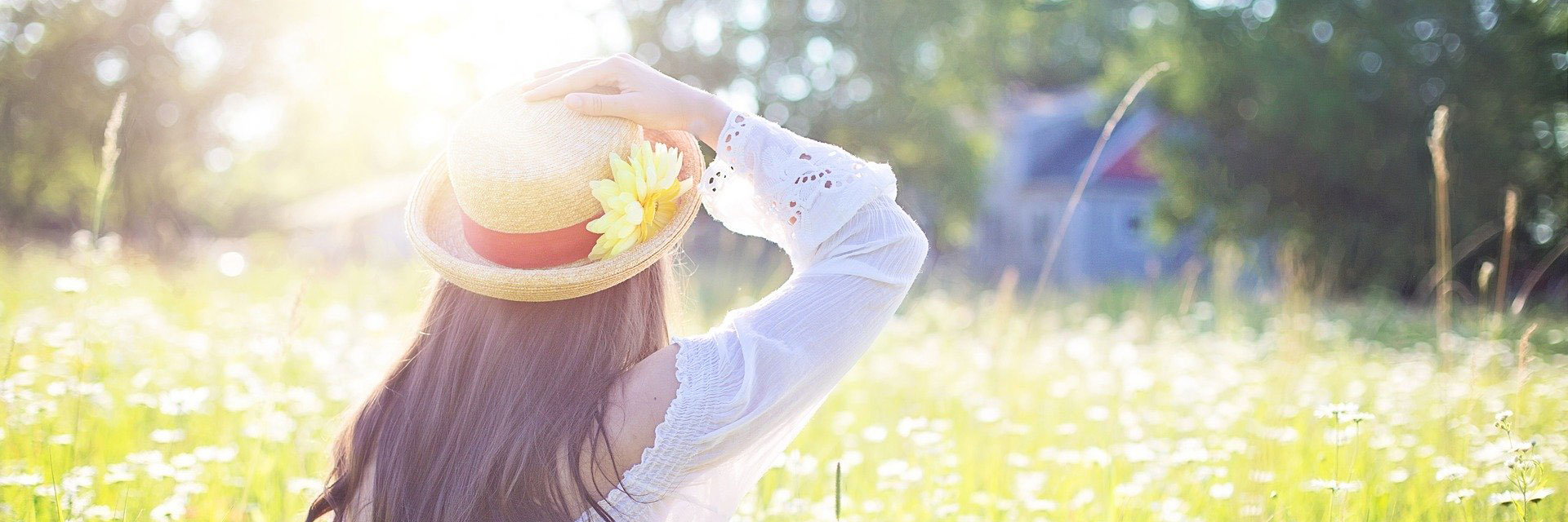 Woman wearing hat in sun