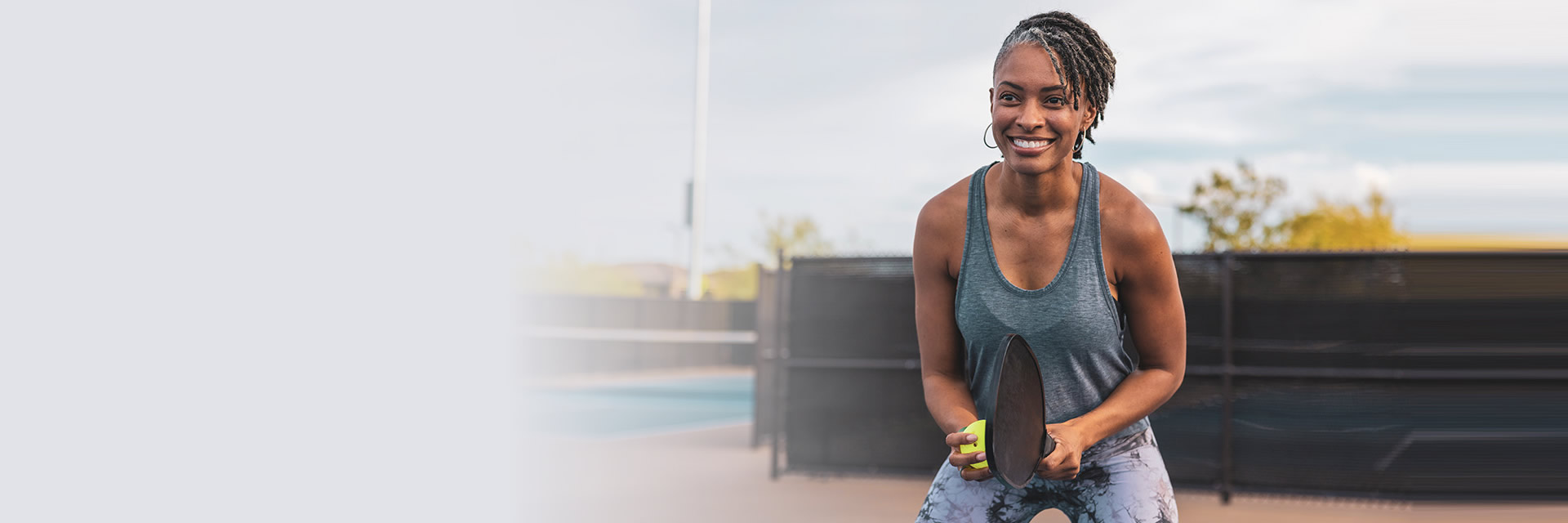 Woman playing pickleball