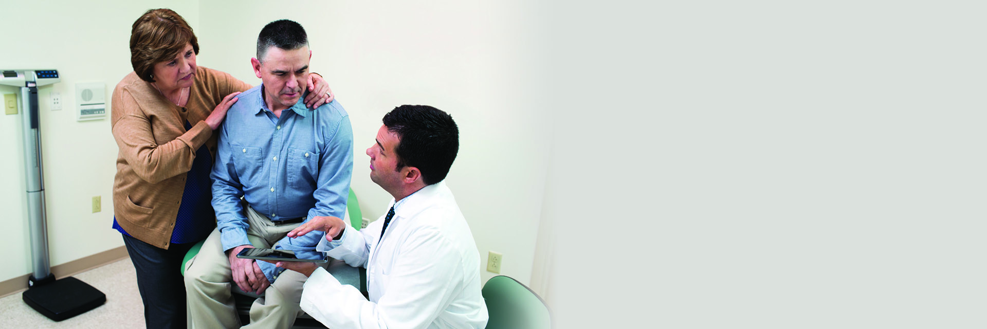 Male Patient Talking to His Doctor