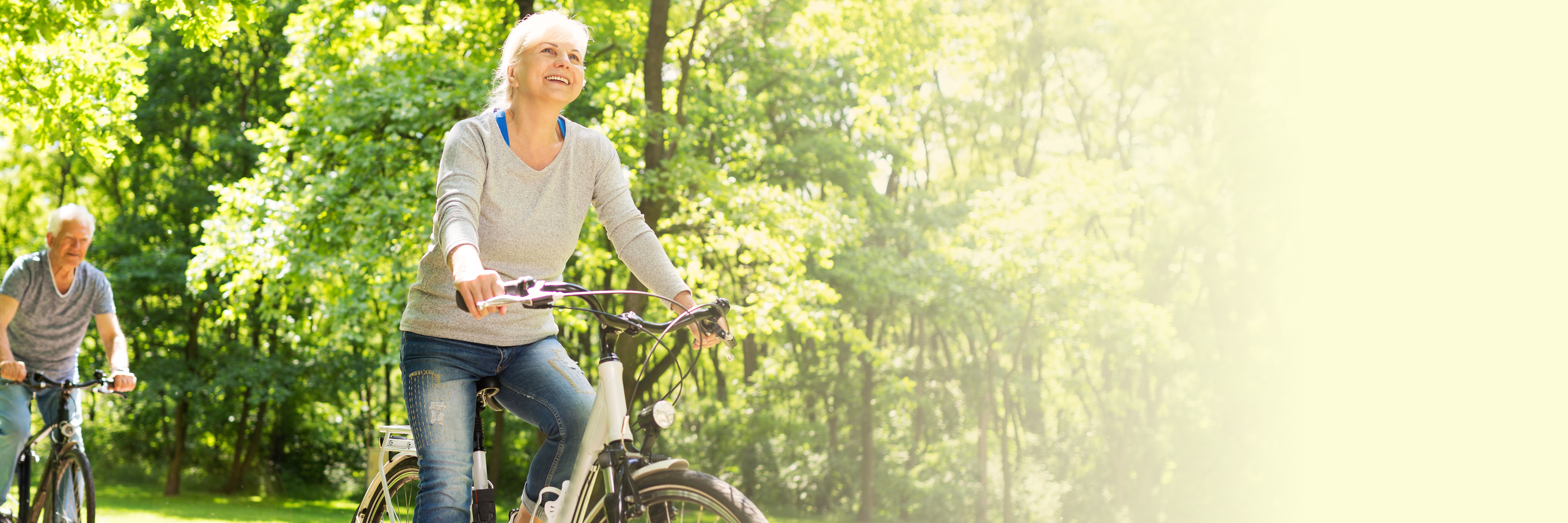 Couple Riding Bikes in the Park