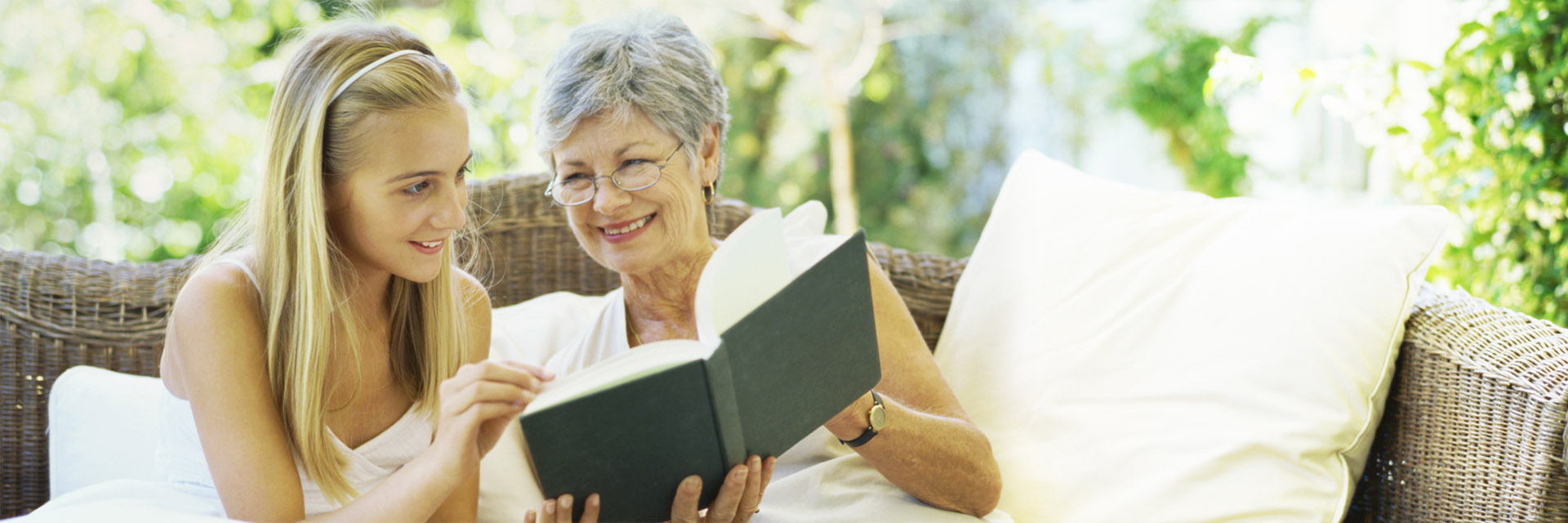 Daughter and Grandmother reading together