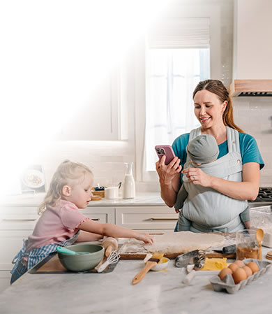 Mom on phone with kids