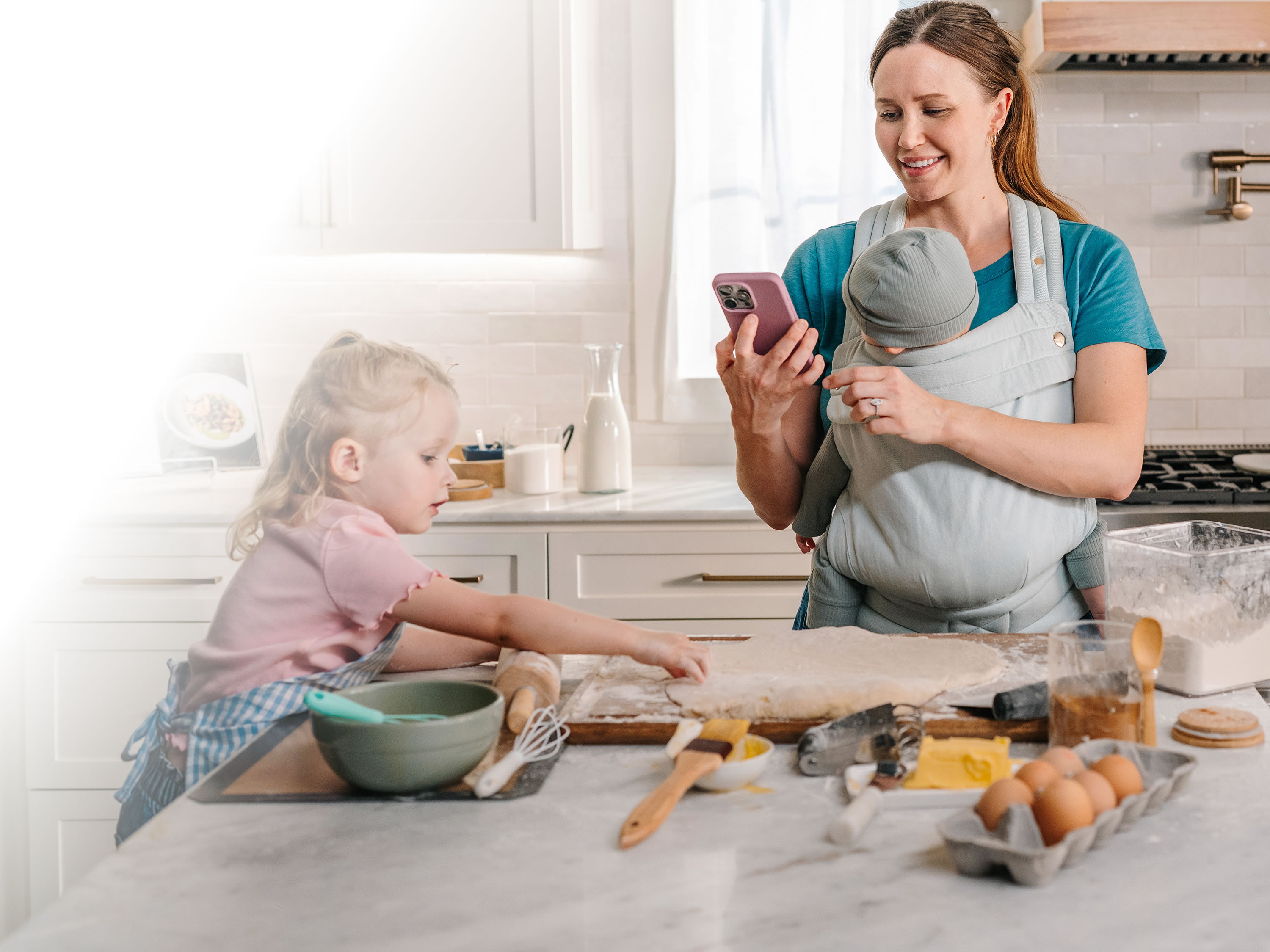 Mom on phone with kids