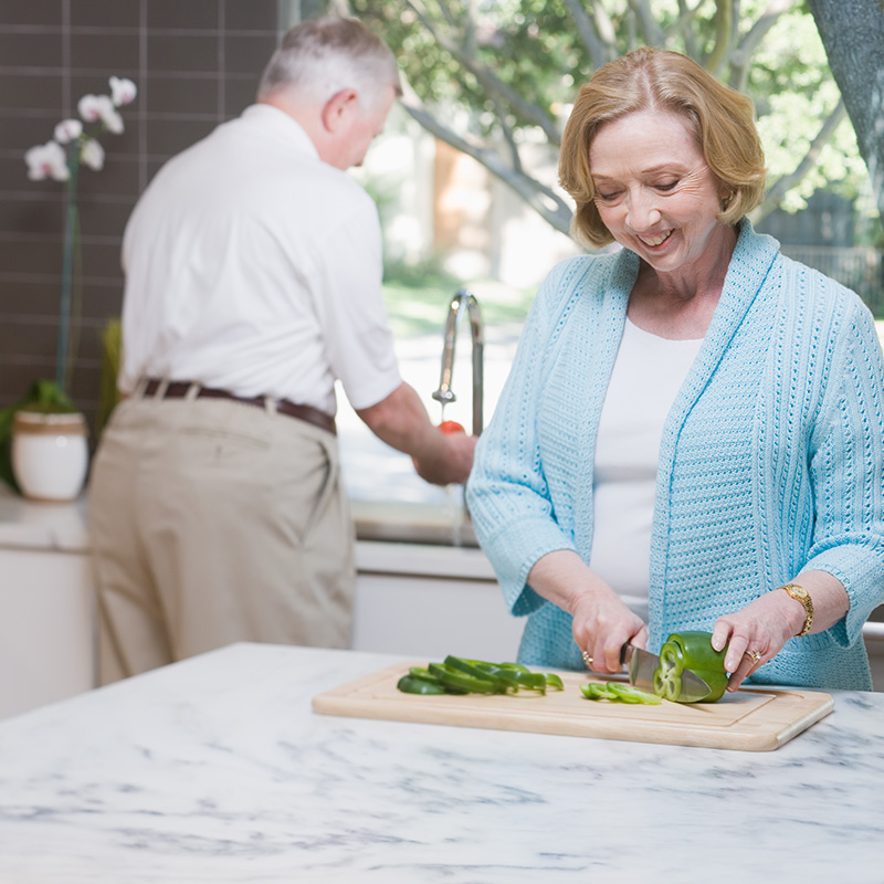 Couple cooking in kitchen