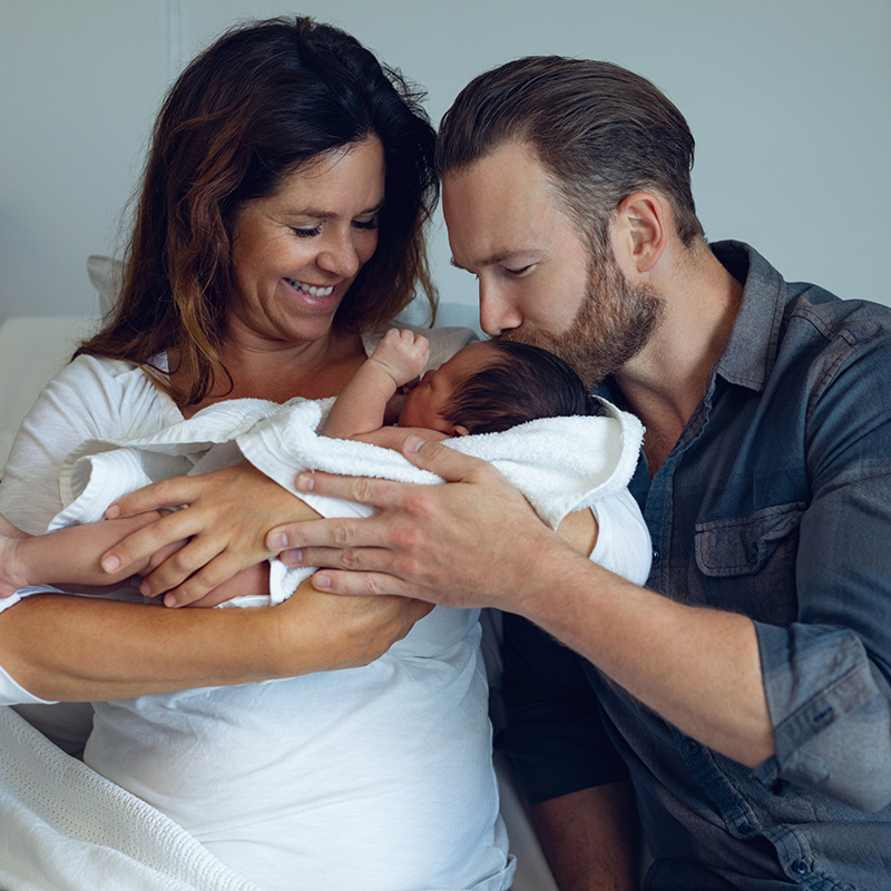 Couple holding baby