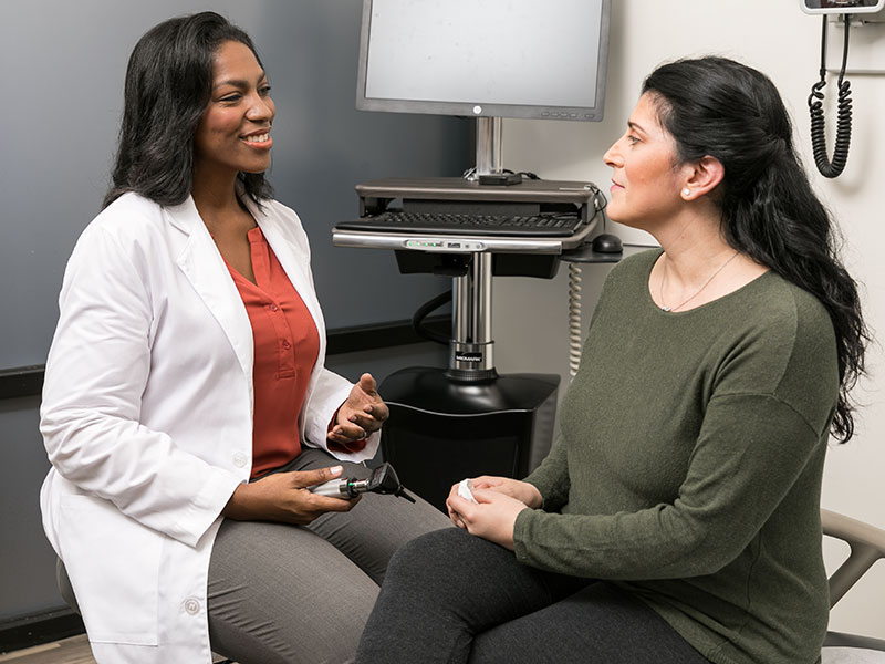 Female Physician with Female Patient