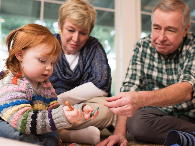 Grandparents with granddaughter