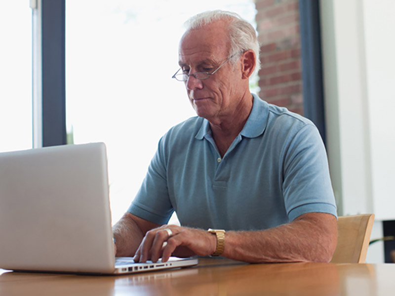 Man Typing on Computer Keyboard