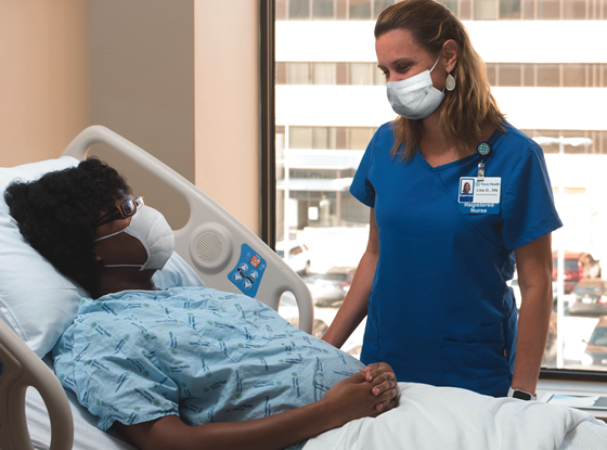 Nurse and patient wearing masksNurse and patient wearing masks