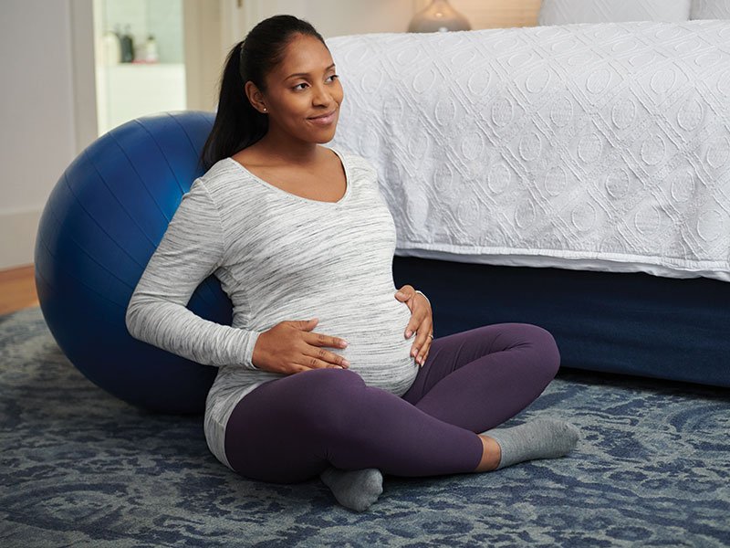 Pregnant woman with yoga ball